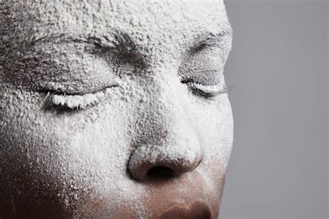 Womans Face Closeup Covered By White Powder Royalty Free Stock Image