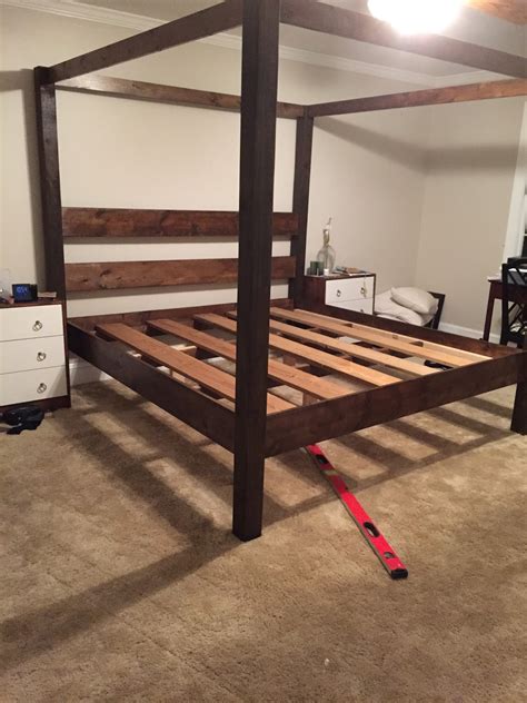 Canopy beds were once a statement of luxury. DIY: Minimalist Rustic King Canopy Bed - Fickle Farmhouse