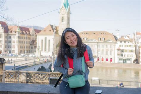 Asian Woman Backpacker Touring In Europe Young Happy And Pretty