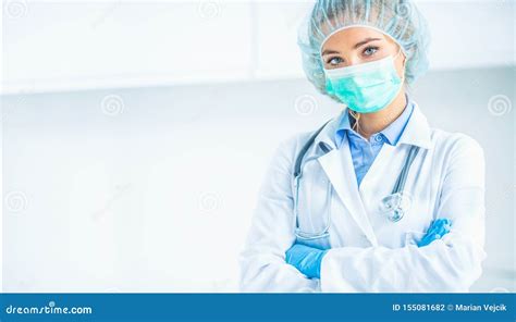 Portrait Of Doctor Woman Surgeon Specialist In Sterile Clothing Stock