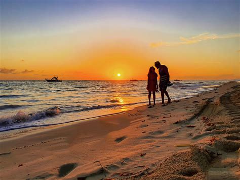Couple In The Sunset On Caribbean Beach Photograph By Valentina Sandu