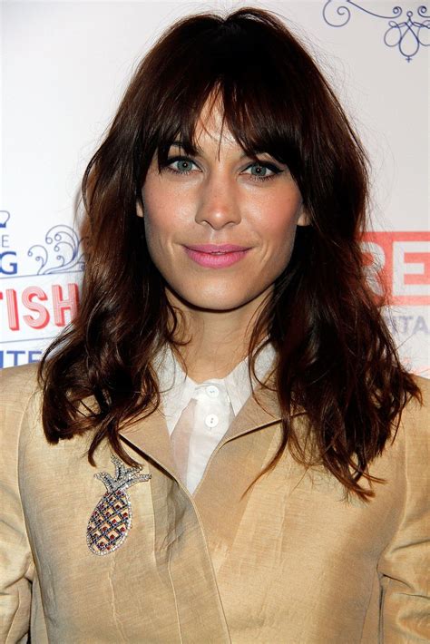alexa chung proves that bangs don t need to be styled perfectly to look cute bedhead inspired