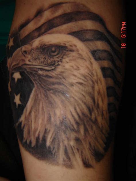 Because an eagle represents nobility and a snake represents our more basic urges, this tattoo often represents an inner conflict, symbolizing the struggle of balance and power. Eagle With American Flag Tattoo Design | Ink. | Pinterest ...