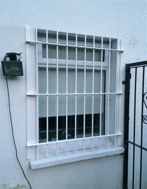 Client Satisfied With The Installation Of Our Rsg2000 Window Bars Securing His Residence In Camd