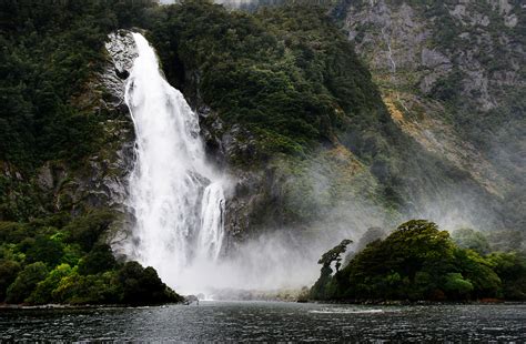 Free Images Waterfall Body Of Water Boats Newzealand Cascades