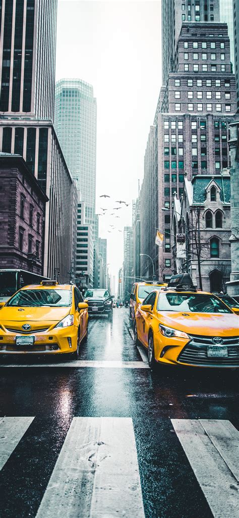 1125x2436 New York Taxi Wet Roads Tall Buildings 5k Iphone Xsiphone 10