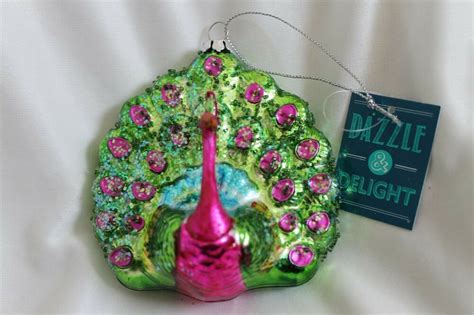 Okura outdoor christmas decorations 320 led star lights, 8 memory lighting modes&timer christmas star lights with 14 lighted star for yard,festival,wedding,party,christmas decorations (white) 3.9 out of 5 stars 18. Dazzle & Delight Peacock Christmas Ornament Kohl's Glitter Green Blue Pink nwt | Christmas Items ...