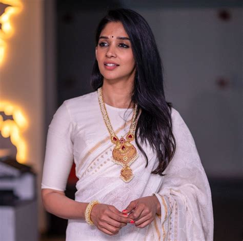 Malayalam Actress Nyla Usha New Stills From Upcoming Movie Priyan