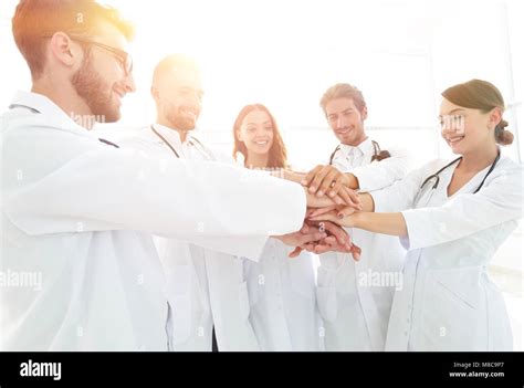 Doctors And Nurses In A Medical Team Stacking Hands Stock Photo Alamy