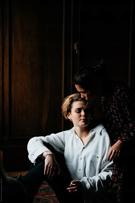 Portrait Of A Beautiful Lesbian Teen Couple In A Dark Room Del Colaborador De Stocksy Thais