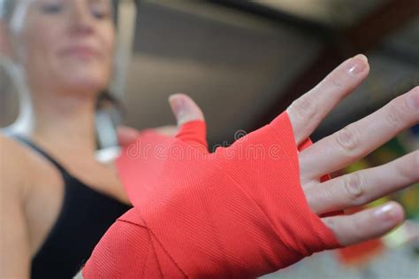 Woman Wrapping Hands With Red Boxing Hand Wraps Stock Image Image Of