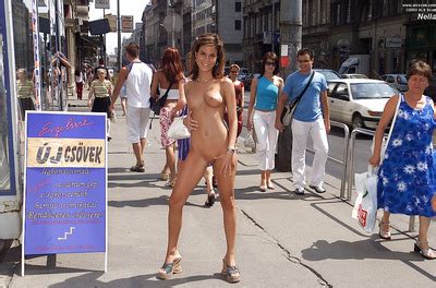 Whore In High Heels Gets Naked And Poses In The Nude On The Crowded Street