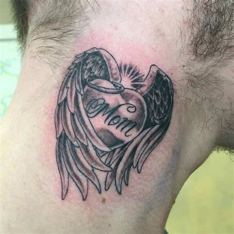heart with angel wings tattoo