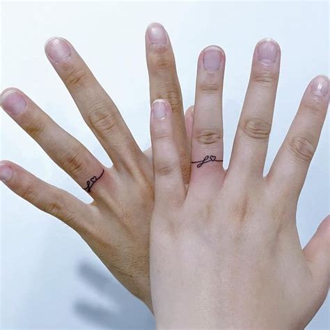 21 Chic And Stylish Ring Tattoo Designs Ring Tattoo Designs Ring