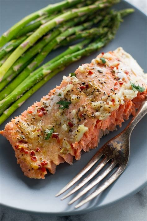 Pour the butter/honey mixture over the salmon, and using a pastry brush or spoon, spread evenly over the salmon. Garlic Butter Baked Salmon in Foil Recipe | Little Spice Jar