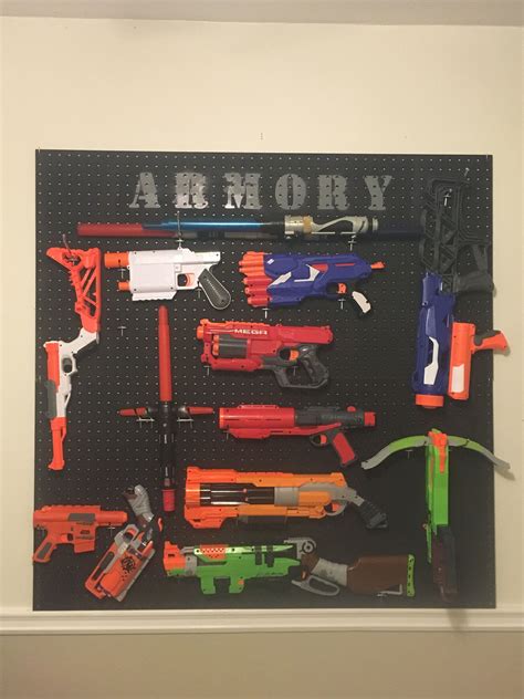 It looks far greater than pegboard and you can place planks. Wall Mounted Nerf Gun Rack - nerf gun rack idea 1 | Those ...