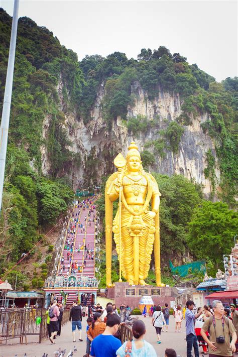 The stage is set for the last leg of the devotees journey towards the entrance of batu caves on this fine thaipusam day in kuala lumpur. BATU CAVES, MALAYSIA - JAN 18 2014 : Thaipusam At Batu ...