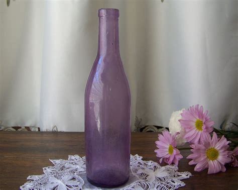 Vintage Purple Glass Bottle Sun Purple Amethyst Bottle Etsy Purple Glass Purple Vase