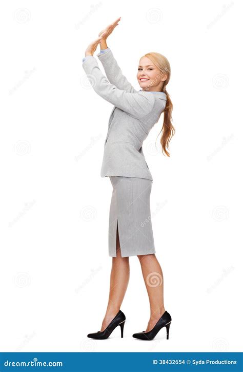 Businesswoman Pushing Up Something Imaginary Stock Photo Image Of