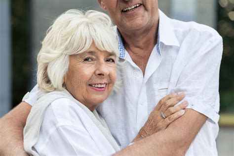 Senior Woman Hugging Her Husband Stock Image Image Of Romance