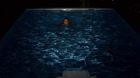 Woman Swims In Swimming Pool At Night Slow Stock Footage Sbv 304397554 Storyblocks