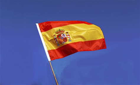 The flag of spain is a symbol of national pride and the rich history of the country. Hand Waving Flag PRO Spain with crest - 2x3 ft - Royal-Flags