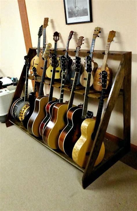 Check spelling or type a new query. Guitar / Banjo / Mandolin / Ukulele Rack from by BarnWoodFurniture | Guitar room, Guitar rack ...