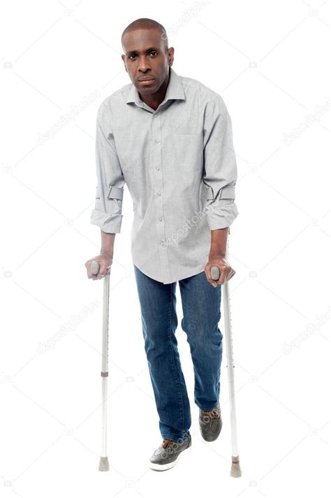 Man On Crutches ⬇ Stock Photo Image By © Stockyimages 46748267