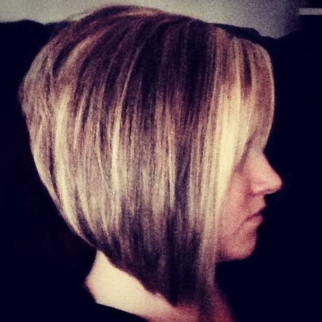 For a flattering and feminine take on the inverted bob, consider opting for a medium length. Hairstyles short in back long in front