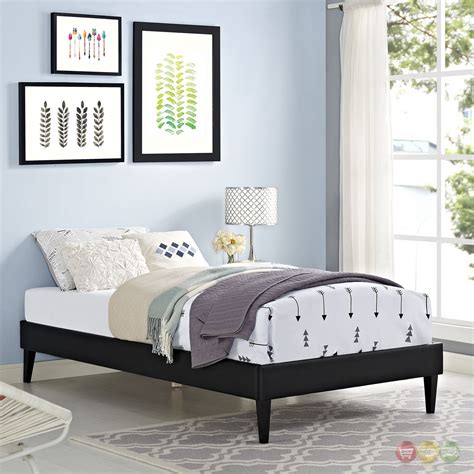 Wood and iron styling give your room an industrial spin. Sharon Modern Twin Vinyl Platform Bed Frame With Square Legs, Black