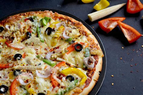 Garlic Crust Vegetable Pizza Recipe By Archanas Kitchen