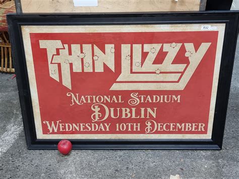 A Very Large Framed Print Advertising Thin Lizzy Performing At The