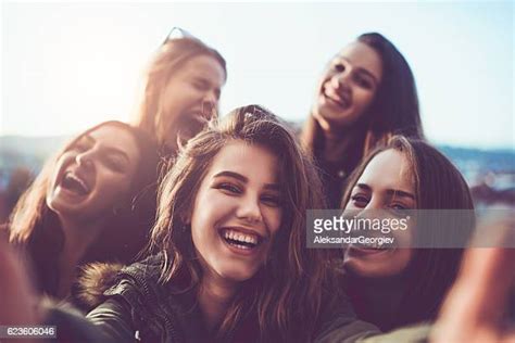 Woman Blowing A Kiss And Woman Blowing A Kiss And Blonde Photos Et