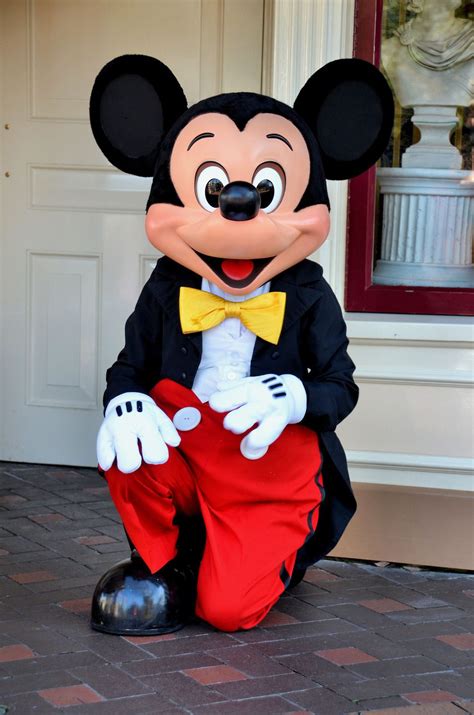 Mickey Mouse Kneeling At Disneyland In Anaheim California Encircle