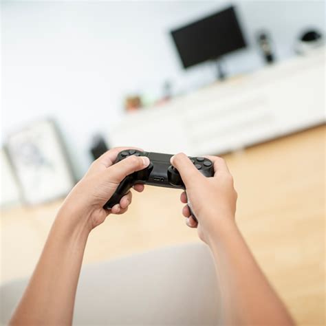 Free Photo Close Up Boy Holding A Game Controller