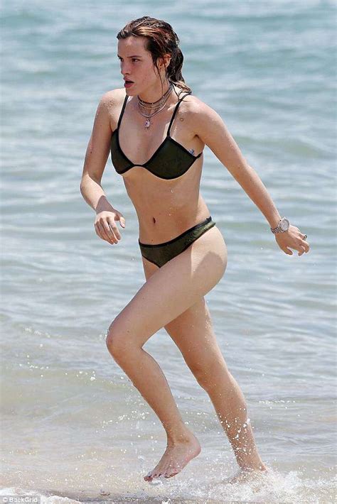 Bella Thorne Shows Off Her Armpit Hair As Bikini Clad Star Frolics On