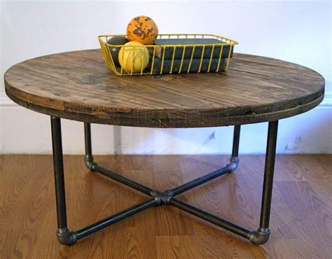 Multi coloured old boat wood style spool coastal coffee table 61 cm x 61 cm diameter 3 sleek silver grey metal hairpin legs made to order. Reclaimed Wood Spool Coffee Table. $260.00, via Etsy ...