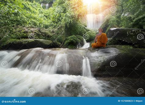 Buddha Monk Practice Meditation At Waterfall Editorial Stock Photo