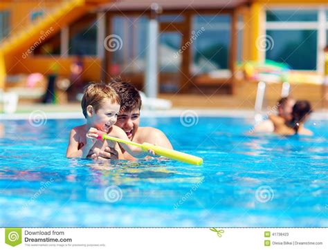 Father And Son Having Fun In Pool Stock Image Image Of Beach Care