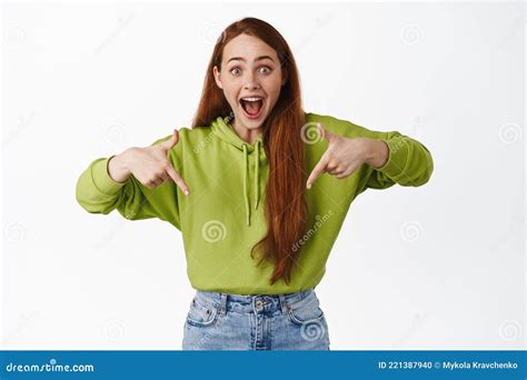 Excited And Impressed Ginger Girl Gasping Smiling Astonished Pointing