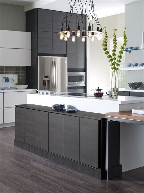 When reviewing pictures of kitchens we are seeing lots of slabs in dark colors, but none in white/off white. Two-toned modern cabinets | Kitchen cabinet styles ...