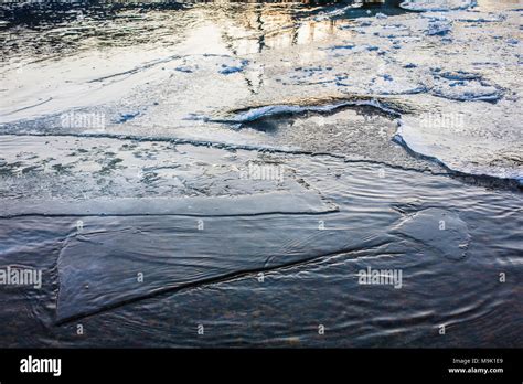 Frozen River Surface Covered With Melting Ice Stock Photo Alamy