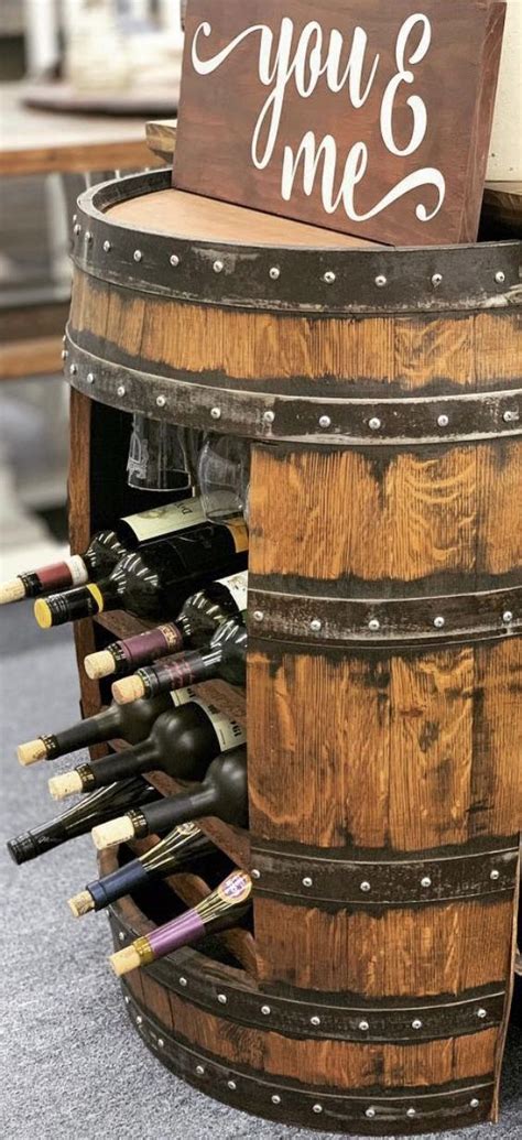 How to make a simple wine/ whiskey rack using pallet wood. whiskey barrel wine rack #whiskeybarrelideas # ...