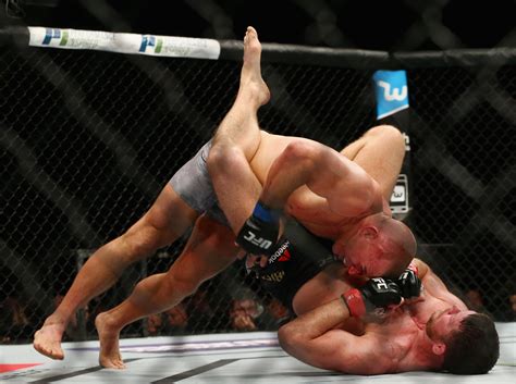 Georges St Pierre Chokes Out British Hero Michael Bisping To Becoming