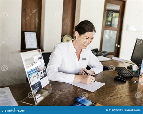 Receptionist Working At The Front Desk Stock Photo Image Of Front
