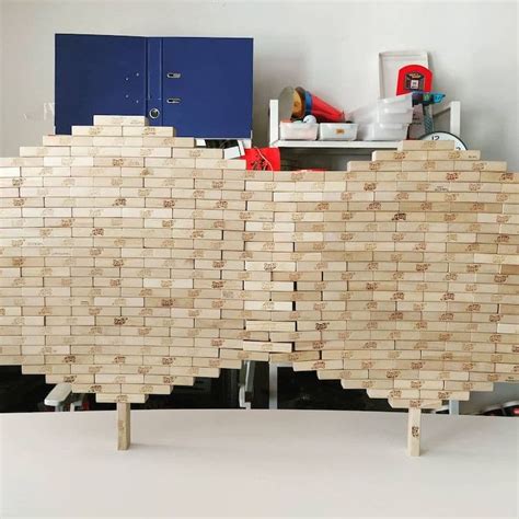 Guy Breaks His Own World Record For Balancing 1 512 Jenga On One