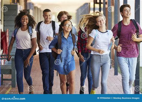 Teenager School Kids Running In High School Hallway Royalty Free Stock