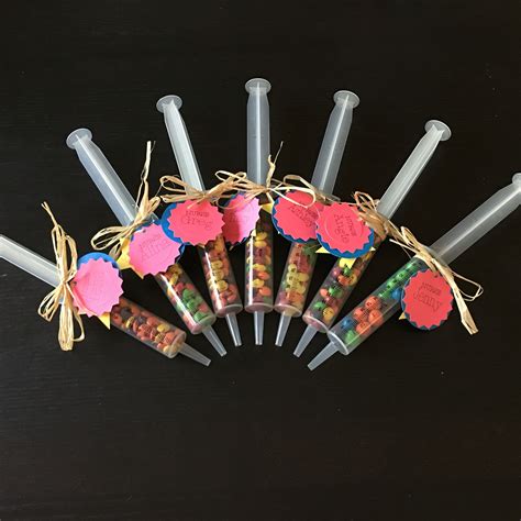 They're super fast and easy to make too. Gift for nurses week. 60cc syringe filled with candy. Tags ...