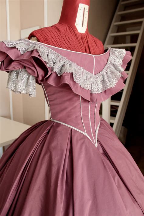 If their best dress was a ball gown they would probably have worn it to. Victorian ball gown in mauve taffeta and silver lace. 1860 ...