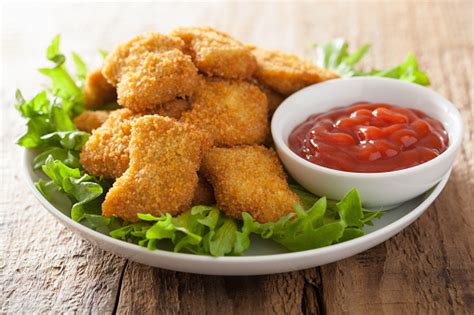 It is so annoying to read reviews (especially poor ones) and see that the cook didn't. Chicken Nuggets With Ketchup Stock Photo - Download Image ...